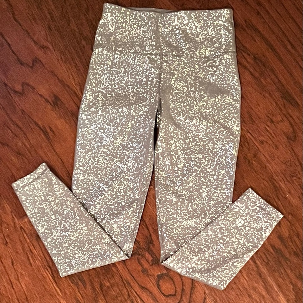 Like New Sweaty Betty London Silver Gray Metallic Goddess Leggings.